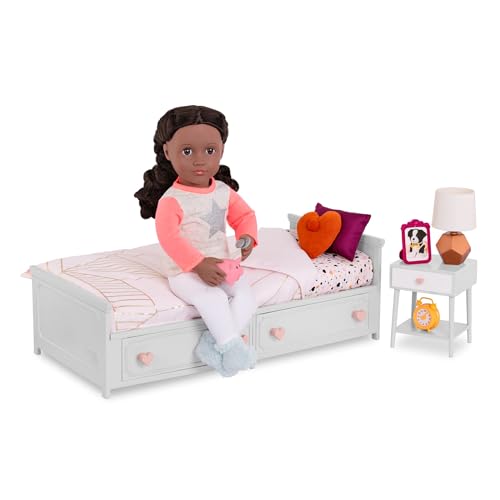 Our Generation 18-inch doll bedding set with pillows and blanket for pretend play in a dollhouse.