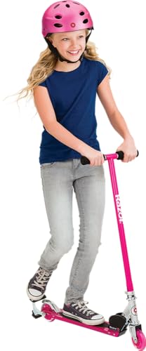 Razor S Real Steel Kick Scooter in pink, featuring a sturdy frame and adjustable handlebars, displayed on a smooth surface.