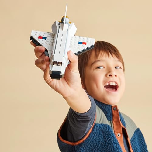 LEGO 31134 Creator 3 in 1 set featuring a space shuttle, astronaut figure, and spaceship model for kids aged 6 and up.