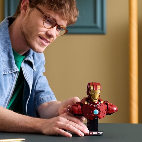 LEGO Marvel Iron Man MK4 Bust model set with Tony Stark minifigure, shoulder cannons, and rotating head for display.