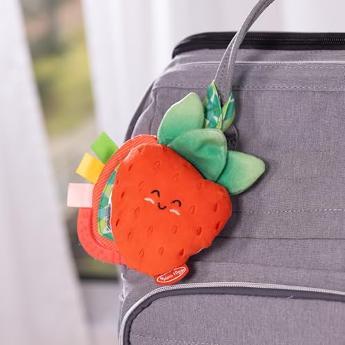 Melissa & Doug multi-sensory peek-a-boo berry infant travel toy clip-on for babies 0-12 months, featuring colorful sensory elements.