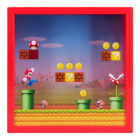 Super Mario money box by Paladone, officially licensed Nintendo piggy bank featuring Mario for savings and fan gifts, 18cm tall.