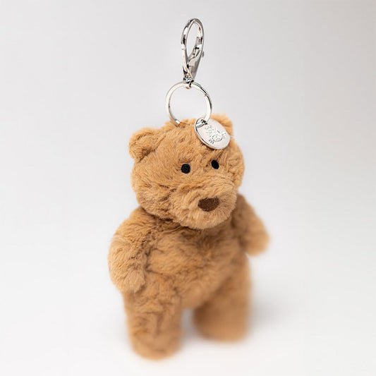 Jellycat Bartholomew Bear bag charm, soft plush bear with cute features, measuring 5x6x12 cm.