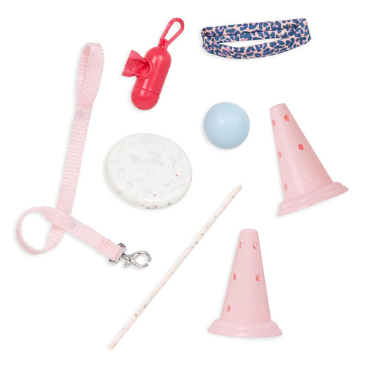 Our Generation Natalia doll with Nillie dog in agility training set, featuring accessories for imaginative play.