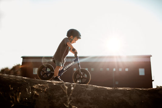 Strider 12” Sport Bike, Blue - No Pedal Balance Bicycle for Kids 18 Months to 5 Years - Includes Safety Pad, Padded Seat, Mini Grips & Flat-Free Tires - Tool-Free Assembly & Adjustments