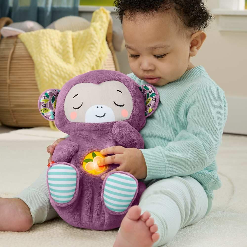Fisher-Price Baby Soothe ‘n Snuggle Purple Monkey plush toy with sound machine, breathing motion, and lights for newborns, ages 0+.