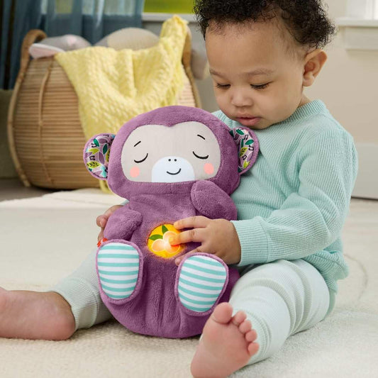 Fisher-Price Baby Toy Soothe ‘n Snuggle purple plush monkey with lights, breathing motion, and sound machine for newborns.