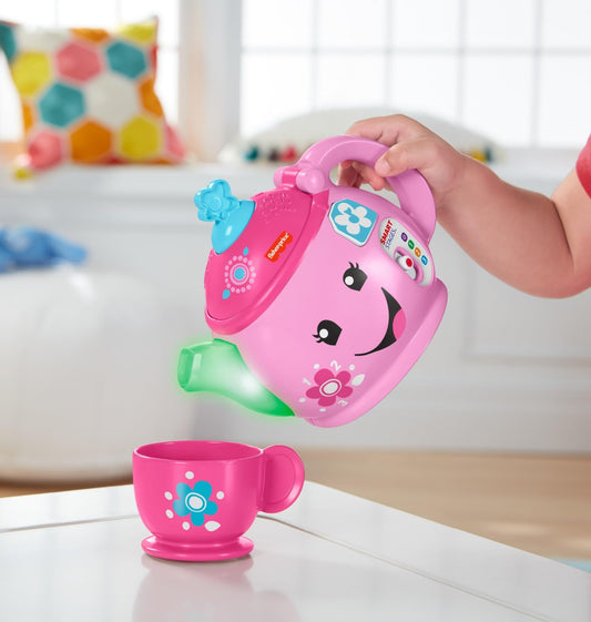 Fisher-Price Laugh & Learn Sweet Manners Tea Set for toddlers with lights, sounds, and pretend tea cups for 18-36 months.