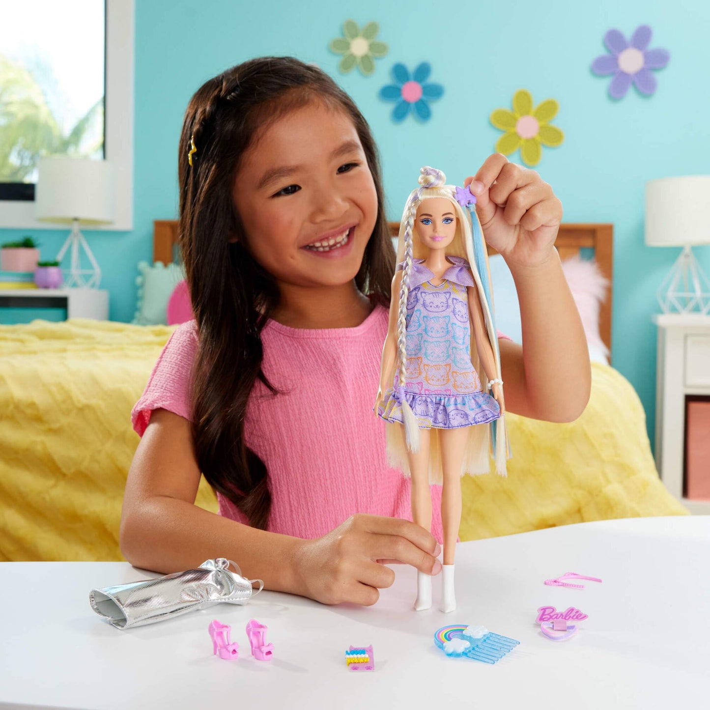 Barbie Fun & Fancy blonde fashion doll with long hair, silver metallic dress, and hair extension accessories.