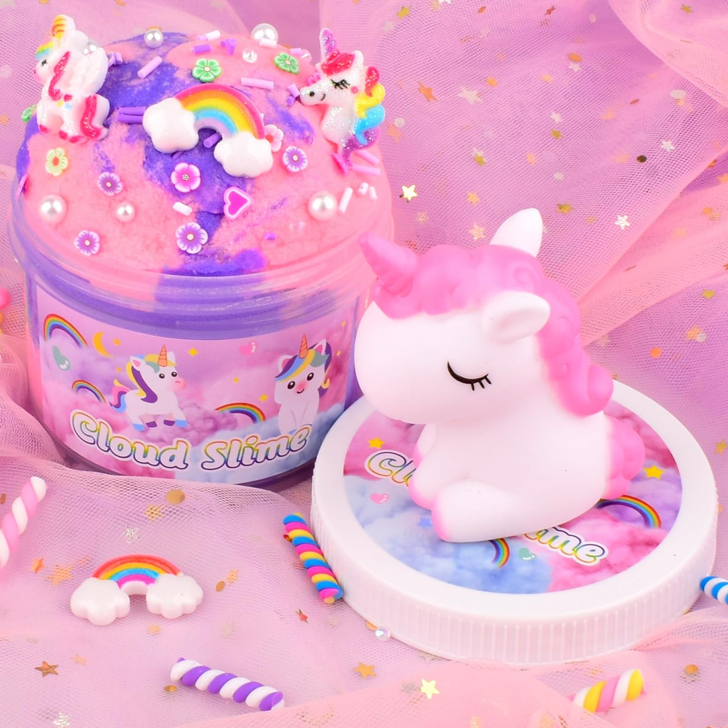 Pink and purple unicorn cloud slime with rainbow charms, soft and stretchy sensory toy for kids by Petyuioyu.