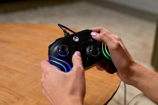 Turtle Beach Afterglow Wave black wired gaming controller with RGB lighting, mappable buttons, hall-effect triggers, and audio controls.