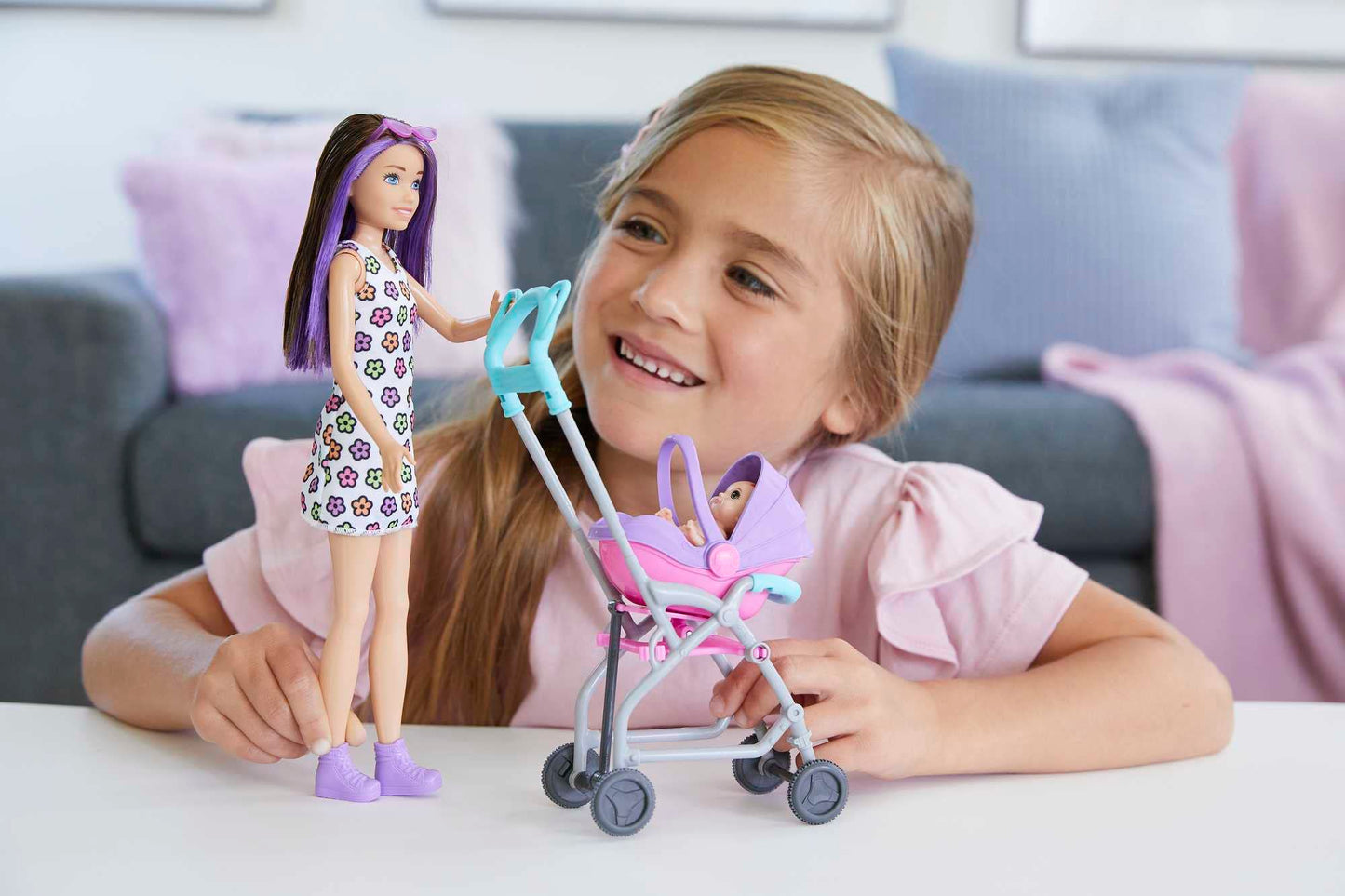 Barbie Skipper Babysitters Inc. playset with Skipper doll, stroller, baby doll, and five accessories for imaginative play.