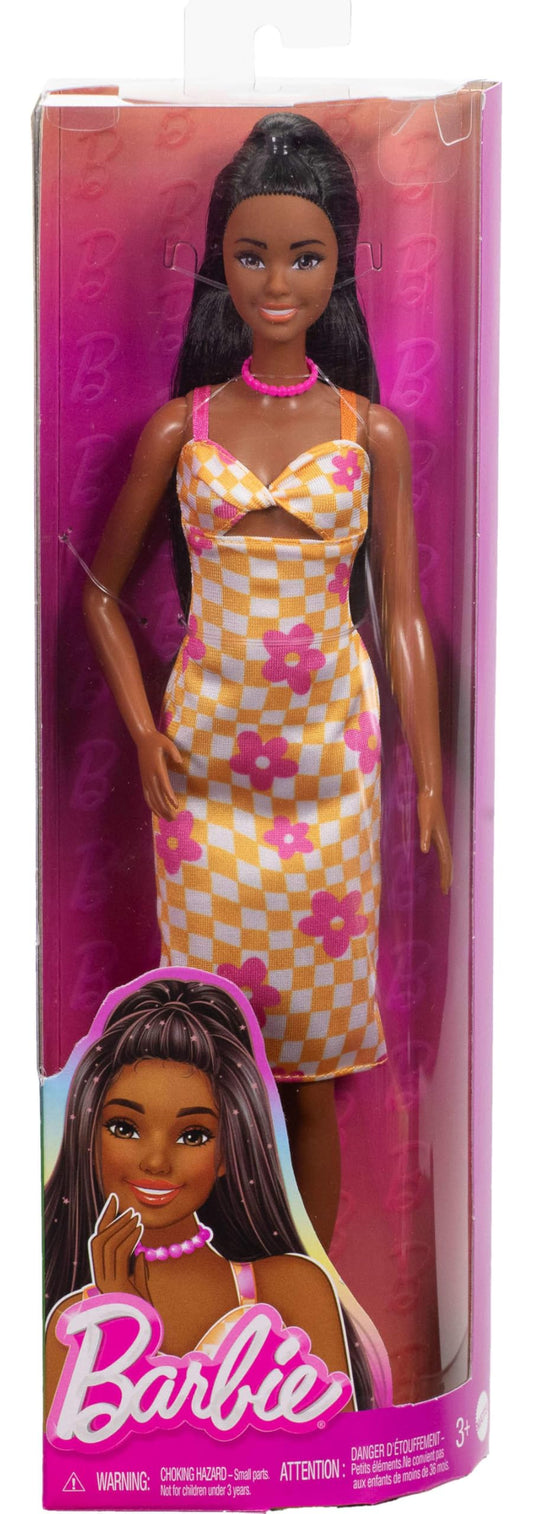 Barbie Fashionistas Doll #233 with black hair in a checkered orange and pink floral midi dress, necklace, and sandals.