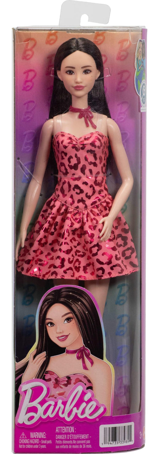 Barbie Fashionistas Doll #246 in pink leopard print dress with black hair, accessorized with a tie necklace and boots.