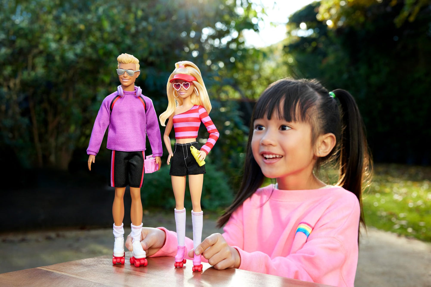 Barbie Fashionistas set featuring Roller-Skating Barbie and Ken with 6 stylish accessories for creative play.