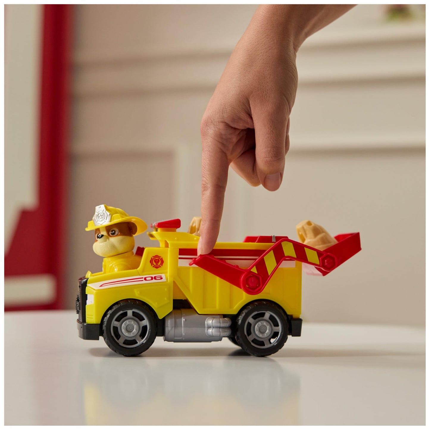 Paw Patrol Fire Rescue: Rubble Rescue Fire Dump Truck with Action Figure, Projectiles, and Toy Truck, Kids Toys for Boys and Girls Ages 3 and Up