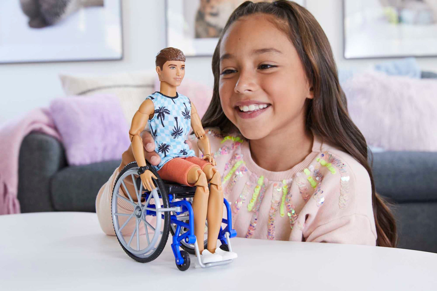 Barbie Ken Doll in wheelchair with ramp, wearing beachy tee and orange shorts, part of Fashionistas collection.