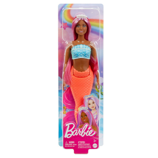 Barbie mermaid doll with magenta hair, curvy body, shell bodice, and tropical red tail, wearing a headband accessory.