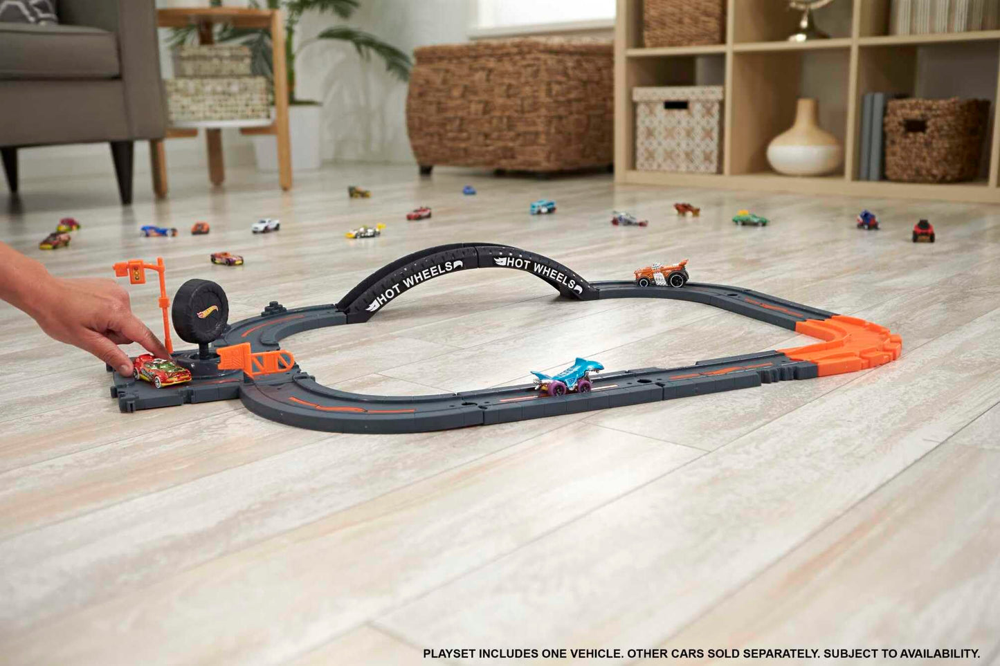 Hot Wheels City Track Pack with 10 pieces, track base, various track pieces, and one car for kids 4 years and up.