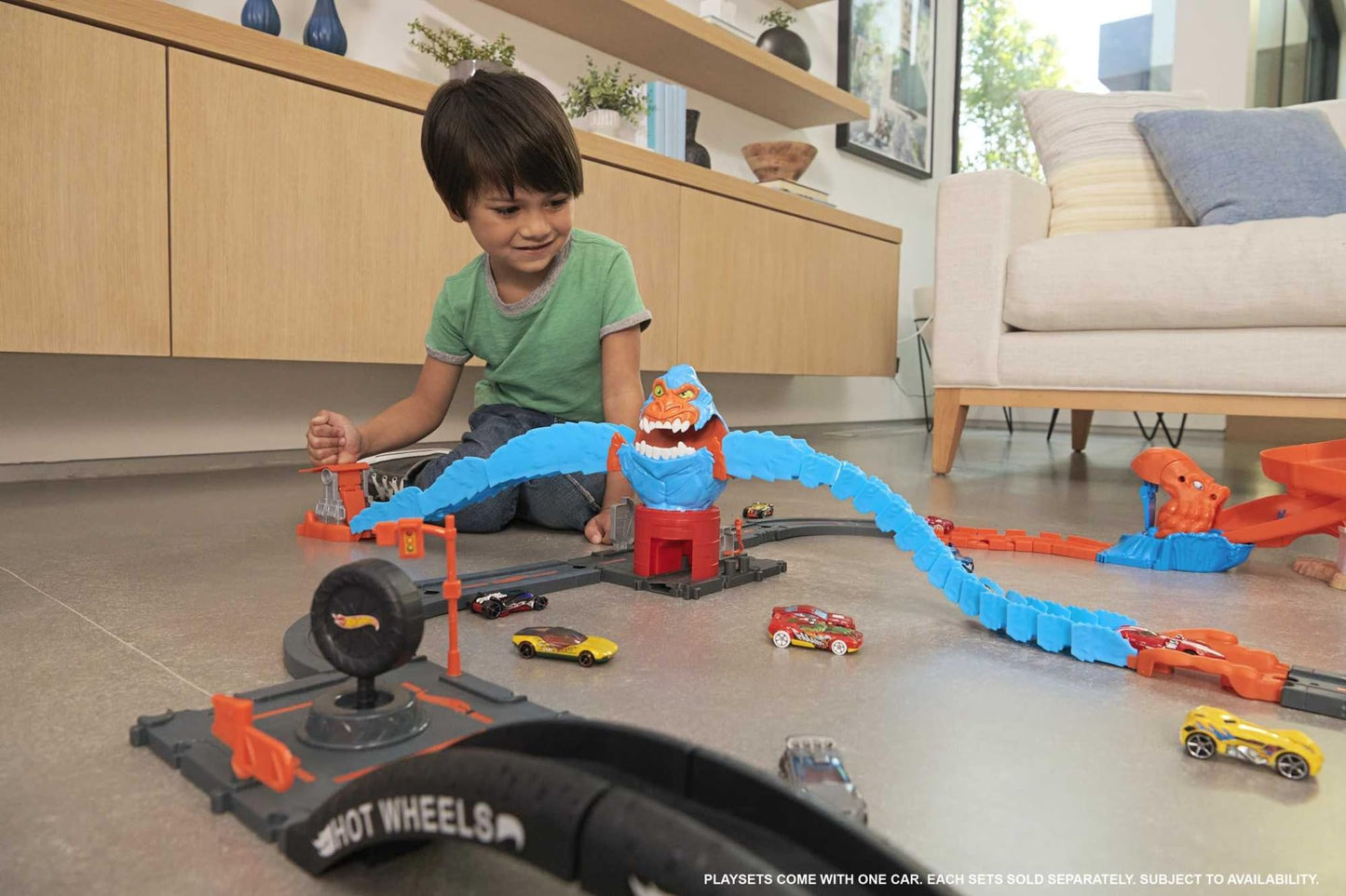 Hot Wheels City Wreck & Ride Gorilla Attack playset with gas station theme and included car for kids ages 4 to 8.