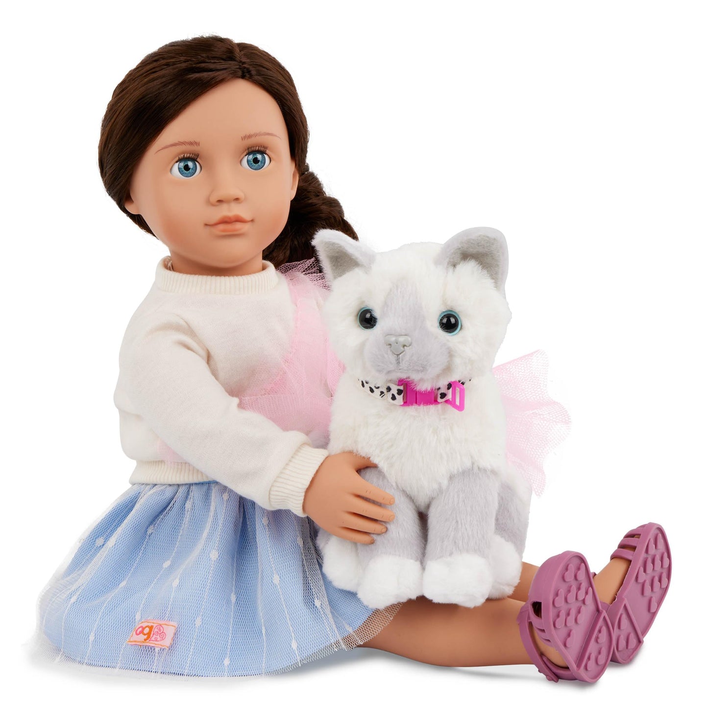 18-inch Our Generation doll Mindy with her kitten Pepper, featuring doll accessories and a plush cat toy.