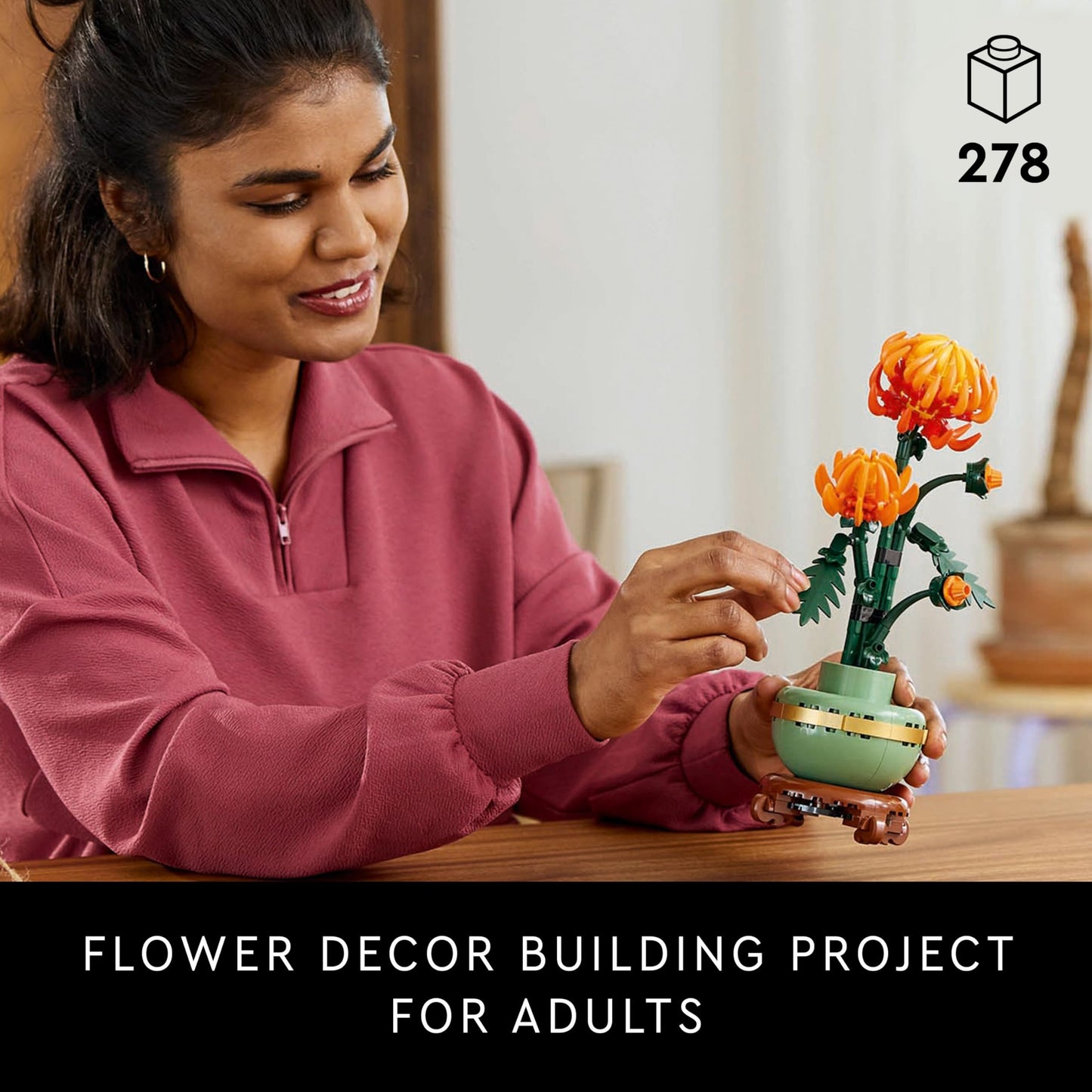 LEGO Botanicals Chrysanthemum building set, featuring detailed faux flowers in a creative model kit for home decor.
