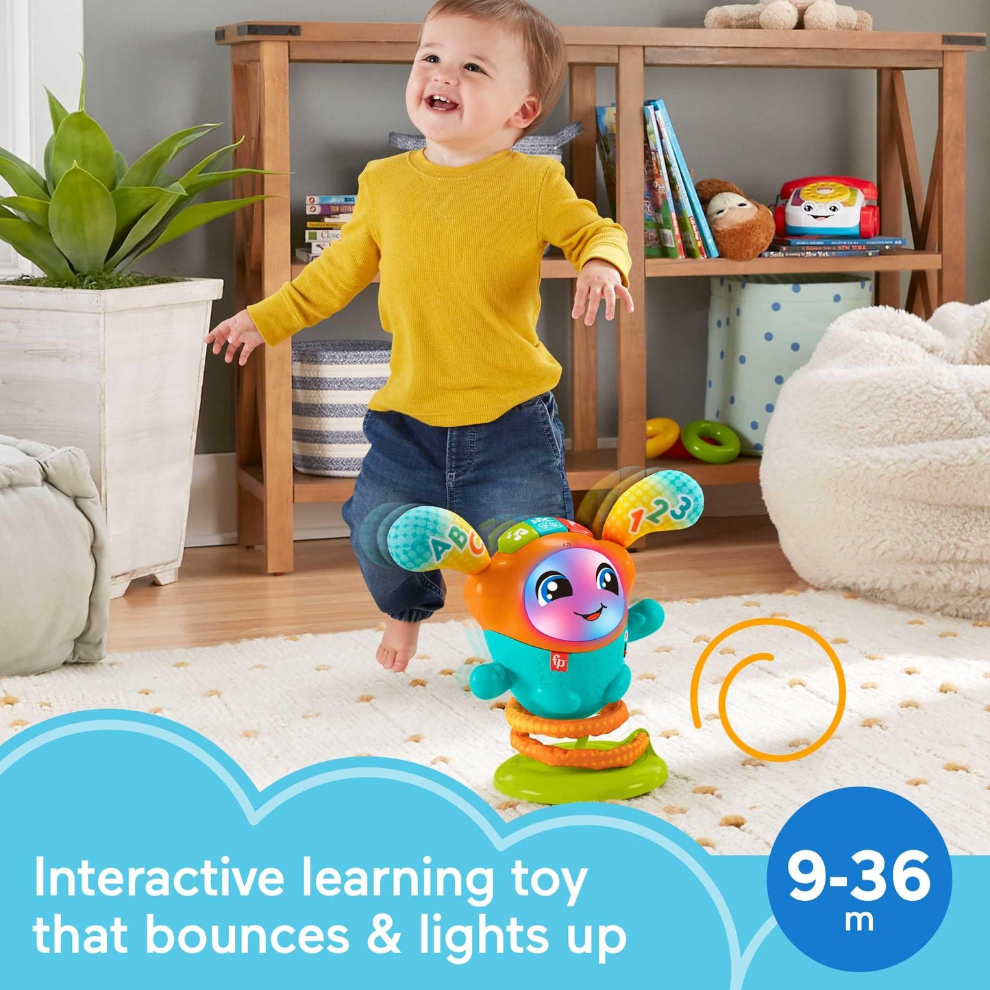 Fisher-Price DJ Bouncin’ Beats baby musical learning toy with colorful buttons and spinning turntable for interactive play.
