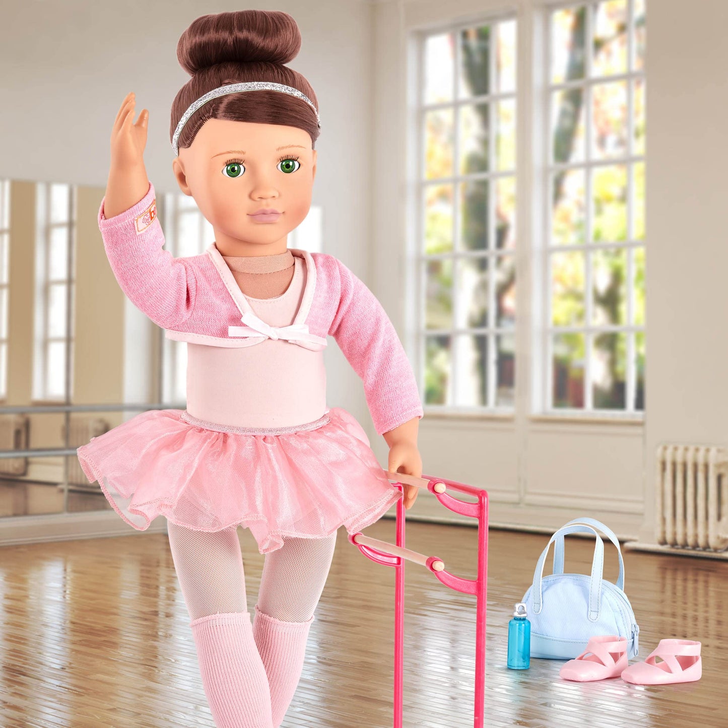 Our Generation Dancing Feet ballet accessory set for 46cm dolls, featuring shoes, tutus, and dance props.