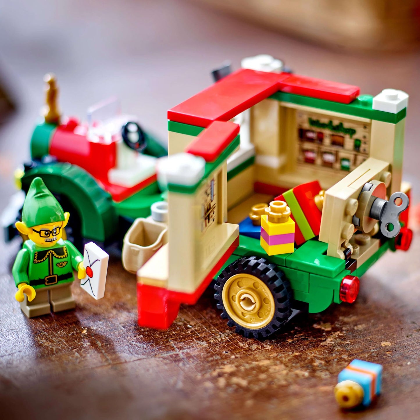 LEGO Santa's Delivery Truck toy with colorful decorations, Christmas tree, and presents for festive play.