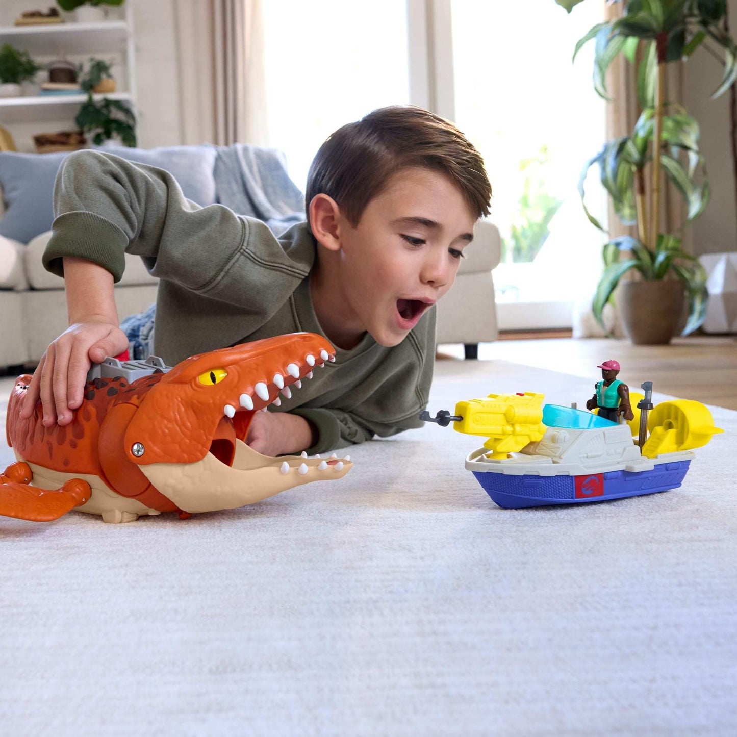 Fisher-Price Imaginext Jurassic World Rebirth Aquachomp Chase Mosasaurus dinosaur toy with action figure, launcher boat, and projectiles