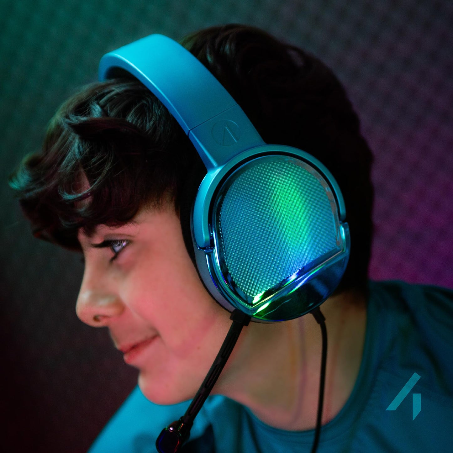 STEALTH PANTHER gaming headset with Plasma Blue accents, over-ear design, adjustable headband, and built-in microphone.