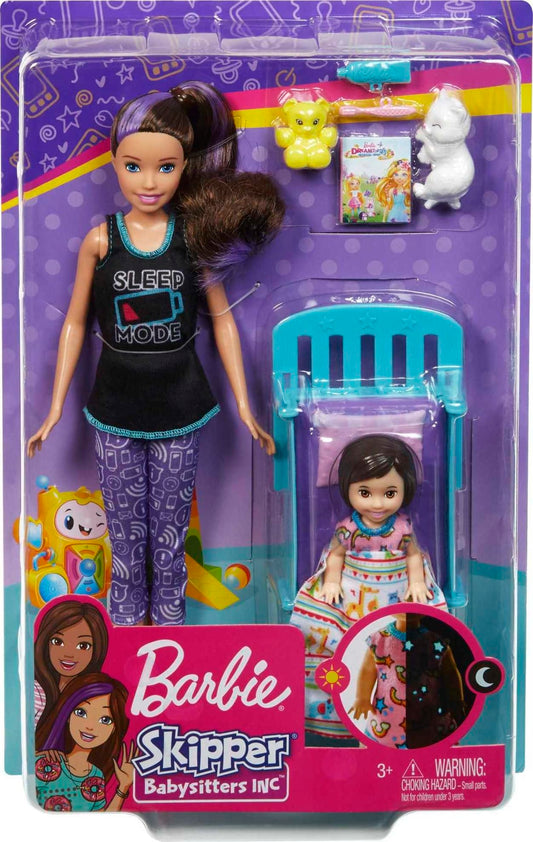Barbie Skipper Babysitters Inc. playset with toddler doll in glow-in-the-dark pajamas, bed, kitty, teddy bear, and blanket.