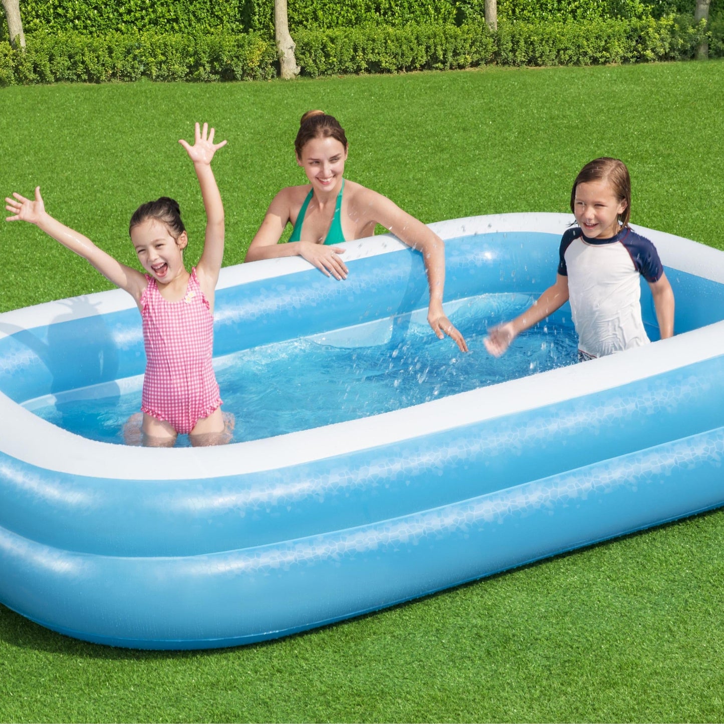 Bestway family inflatable paddling pool in a garden setting, perfect for outdoor fun and relaxation, holds 778L of water.