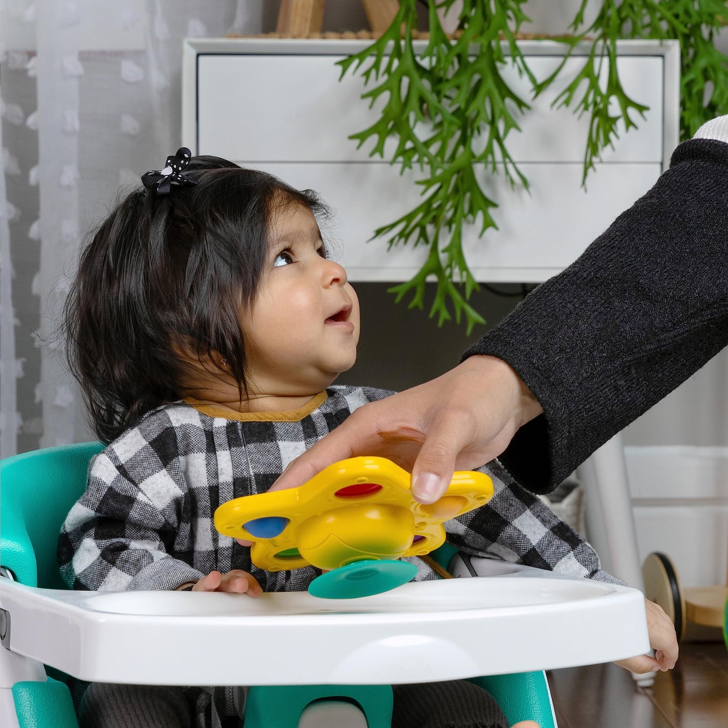 Baby Einstein Ocean Explorers starfish sensory popper toy with glowing lights, designed for babies 6 months and older.
