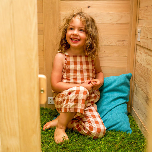 TP Buttercup Cottage wooden playhouse for kids with FSC certified wood, perspex windows, and customizable design for outdoor fun.