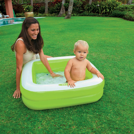 Intex inflatable square paddling pool in pink or lime green, measuring 86x86x25 cm, ideal for kids' summer fun.