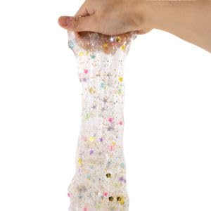 Clear slime pot from So Slime with metallic foil and decorations for customizing glitzy, glamorous slime creations.