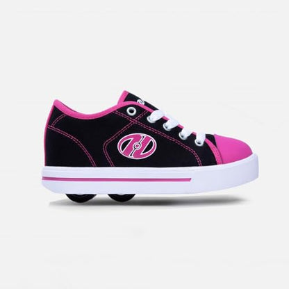 Heelys girls skate shoes in black, white, and hot pink with wheels, size 3 UK, designed for kids' active play and skating.