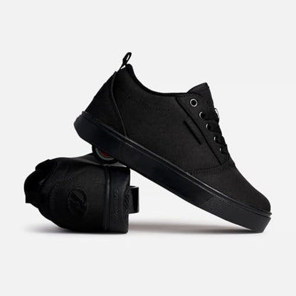Heelys Unisex Pro 20 skate shoe in black with white accents, featuring a sleek design and wheels for skating fun.