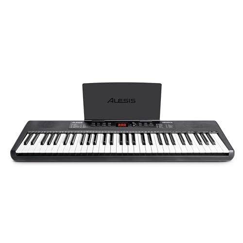 Alesis Melody 61 keyboard piano with 61 keys, built-in speakers, stand, bench, headphones, and tablet/music stand for beginners.