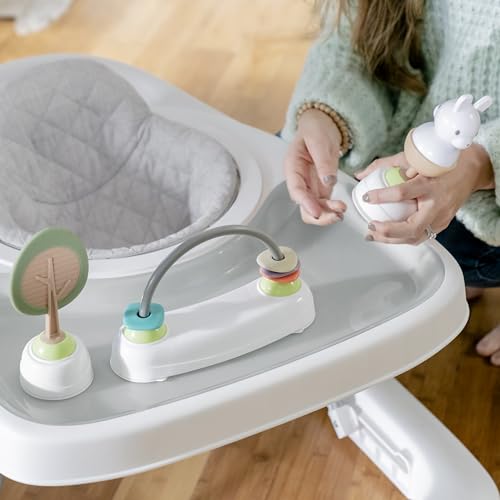 Ingenuity Spring & Sprout First Forest 3-in-1 baby activity walker with colorful nature-themed toys and adjustable height.