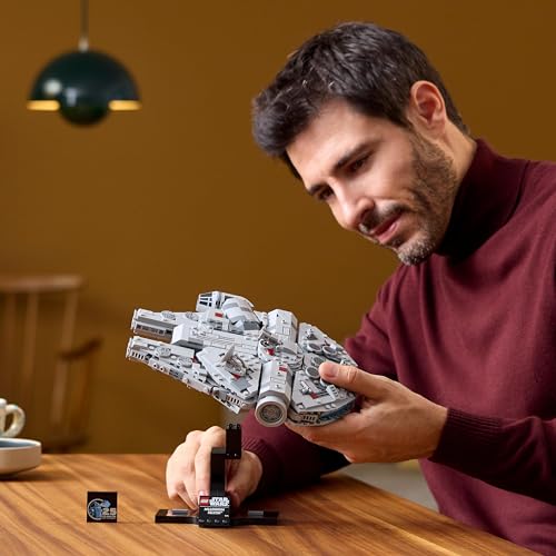 LEGO Star Wars 75375 Millennium Falcon building set with display stand, showcasing intricate details and design for collectors.
