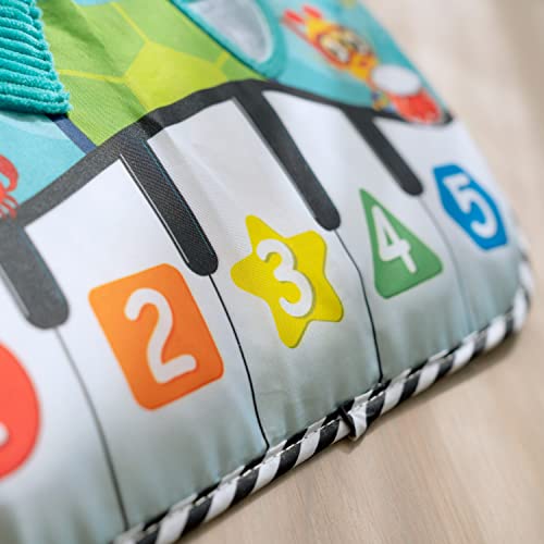 Baby Einstein Ocean Explorers Neptune's Kick & Explore musical crib toy with colorful ocean-themed design for infants 0 months and up.
