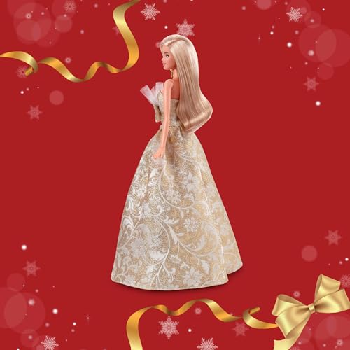 Barbie Signature 2025 Holiday Doll in silver and gold gown, featuring blonde hair and displayable packaging.