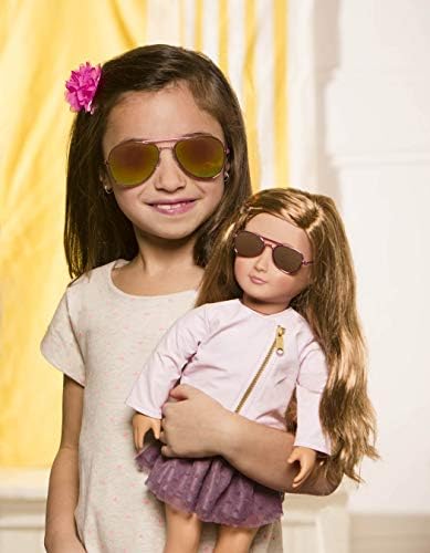 Our Generation Vienna 46cm non-posable fashion doll with purple and pink outfit, dress, pink jacket, undies, and sandals.