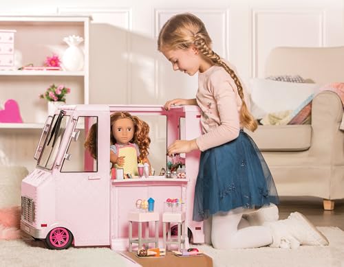 Our Generation pink ice cream truck playset with 129 accessories for 18-inch girl dolls, featuring a detailed exterior design.