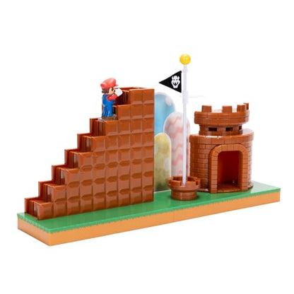 Super Mario 2.5-inch playset by JAKKS Pacific featuring castle, flagpole, stairs, base platform, and mini Mario figurine.