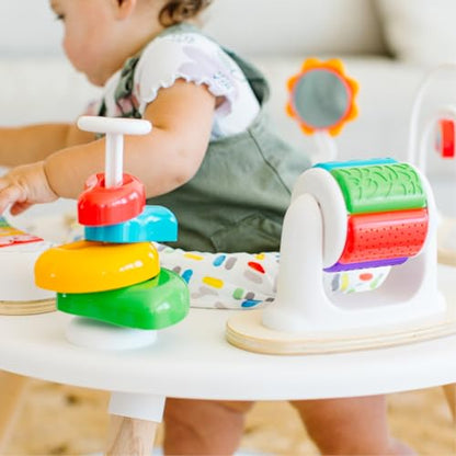 Move2Play 4-in-1 Baby Activity Center with colorful toys, sun mat for tummy time, exersaucer, and jumper for 3-6 months.