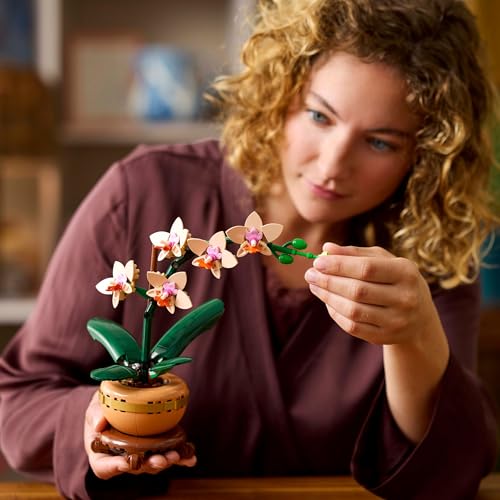 LEGO Botanicals Mini Orchid set in a terracotta pot, featuring vibrant artificial flowers for indoor decor.