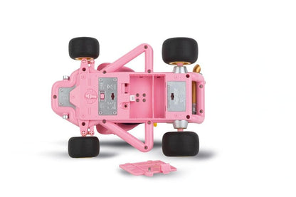 Pink Carrera RC Mario Kart Pipe Kart featuring Peach character, remote control racing car with colorful Mario Kart design.